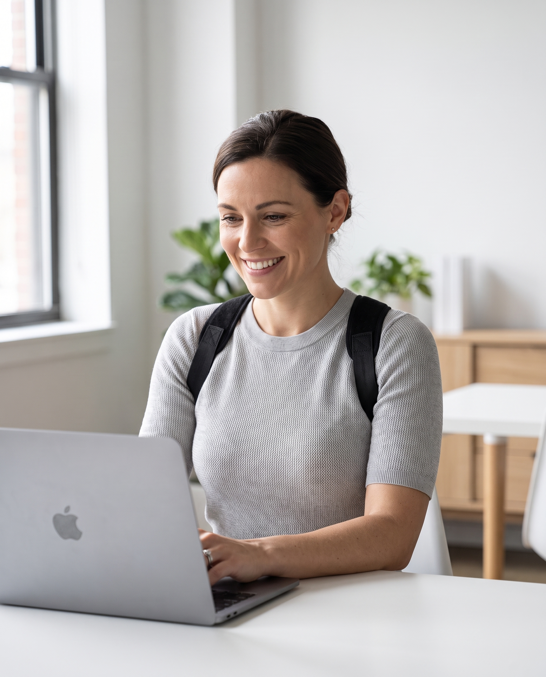 Apex Align Posture Corrector - lifestyle, professional woman working at desk